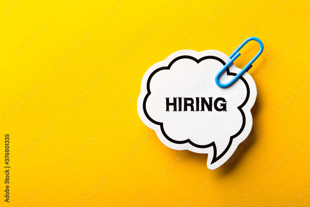 Hiring Business Concept On Yellow Background Hiring Business Concept On Yellow Background