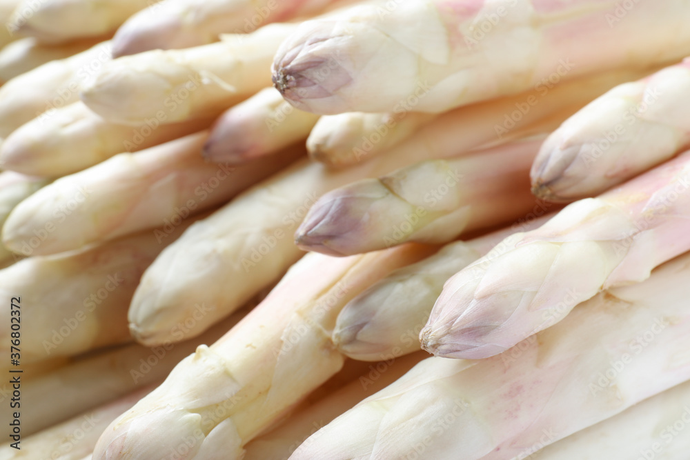 Fresh ripe white asparagus as background, closeup Fresh ripe white asparagus as background, closeup
