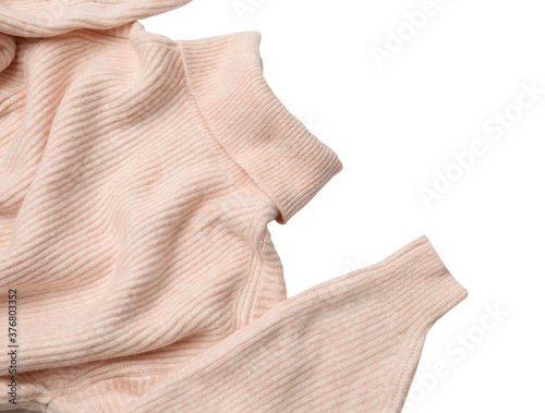 Pink turtleneck sweater on white background, closeup