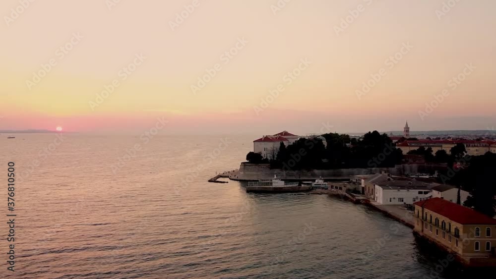 Drone flying over Zadar in Croatia looking at the sunset in summer Drone flying over Zadar in Croatia looking at the sunset in summer