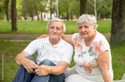 Old man and attractive old woman are enjoying spending time together