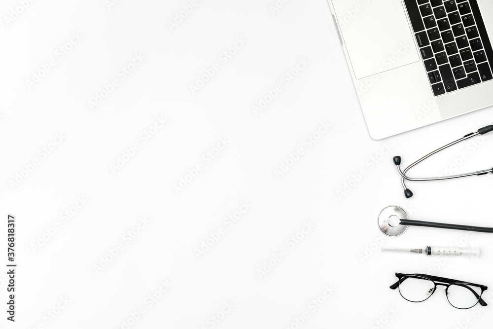 Workplace of modern doctor table with laptop Workplace of modern doctor table with laptop