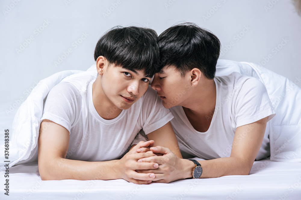 Two beloved young men slept in bed together. Two beloved young men slept in bed together.