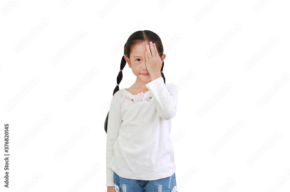 Portrait of little asian child girl closing one eye with hand isolated on white background looking camera. Kid as vision test. Portrait of little asian child girl closing one eye with hand isolated on white background looking camera. Kid as vision test.