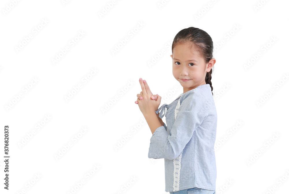Portrait asian little child girl expression finger with imaginary gun isolated on white background with copy space. Kid gesture hand in shape of gun with looking at camera. Portrait asian little child girl expression finger with imaginary gun isolated on white background with copy space. Kid gesture hand in shape of gun with looking at camera.