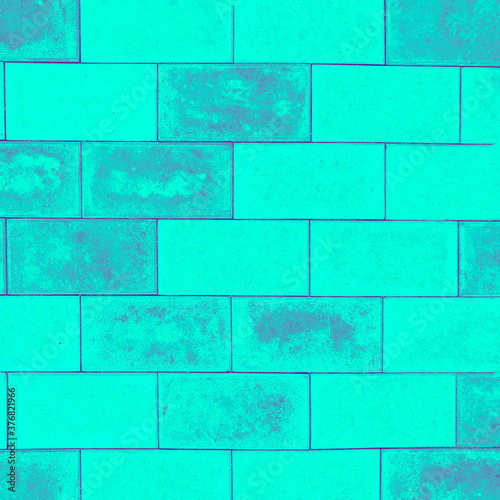 Background of the brickwork. Structural material. For designers. Interior of the building facade. Masonry. Construction industry. Square photo. The color is blue.