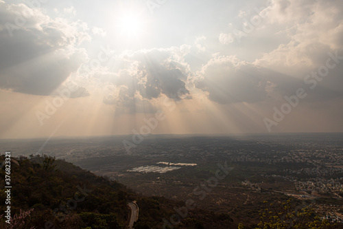 The view over Mysore from the Chamundi Hills lookout point  showing the city.