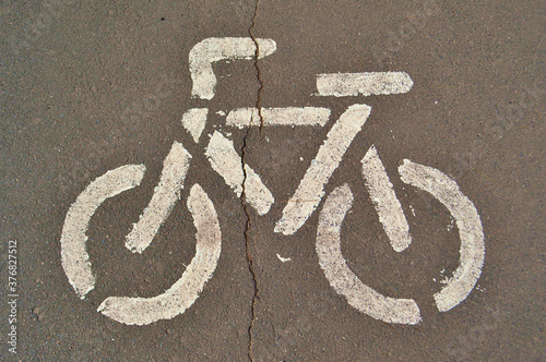 schematic image of a bicycle on the asphalt