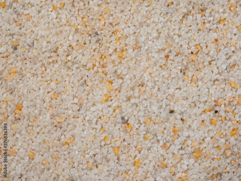 textural plaster of the house wall, colored granite chips, background textural plaster of the house wall, colored granite chips, background