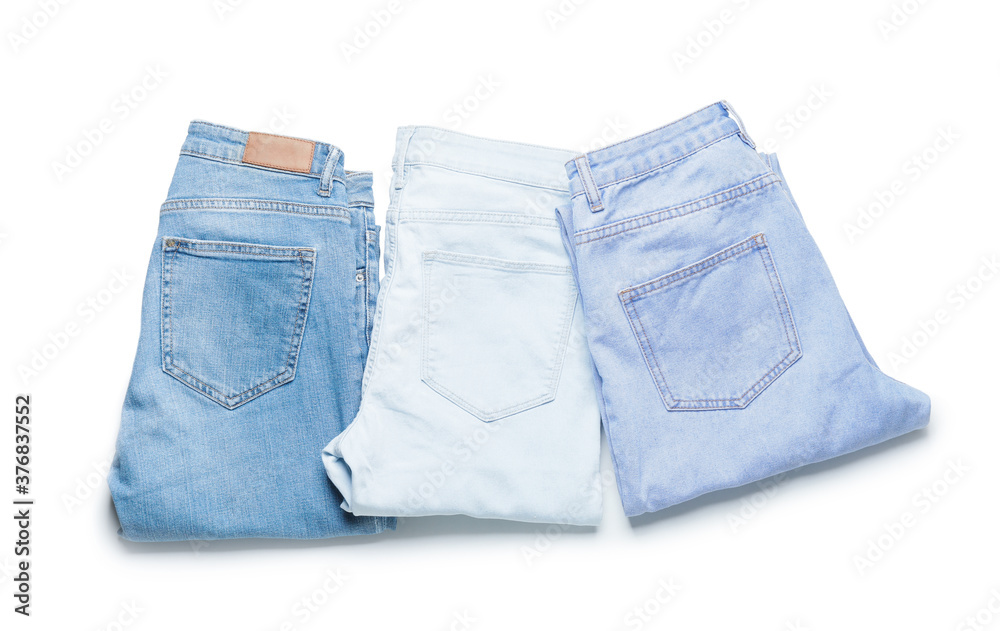 Modern stylish jeans on white background