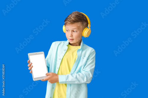 Little boy with tablet comp...