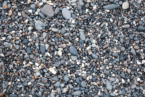 Stone pebbles by the sea.