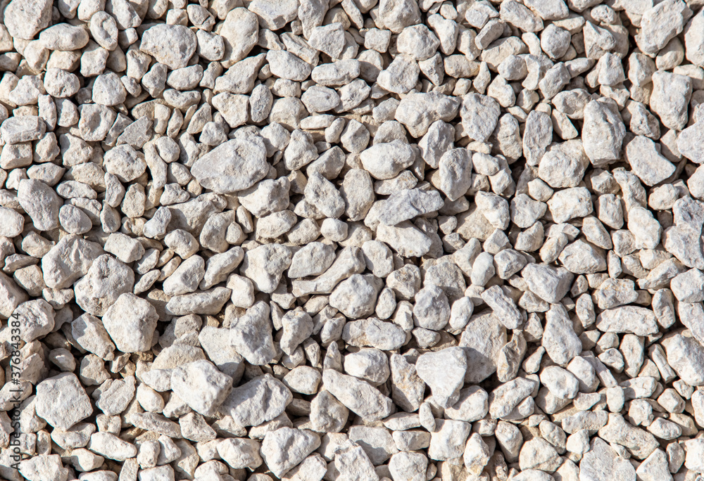 Stone gravel at a construction site as a background. Stone gravel at a construction site as a background.