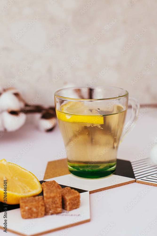 cup of tea with lemon and cinnamon