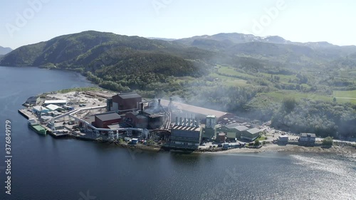 Norwegian industrial silicon plant next to the fjords photo