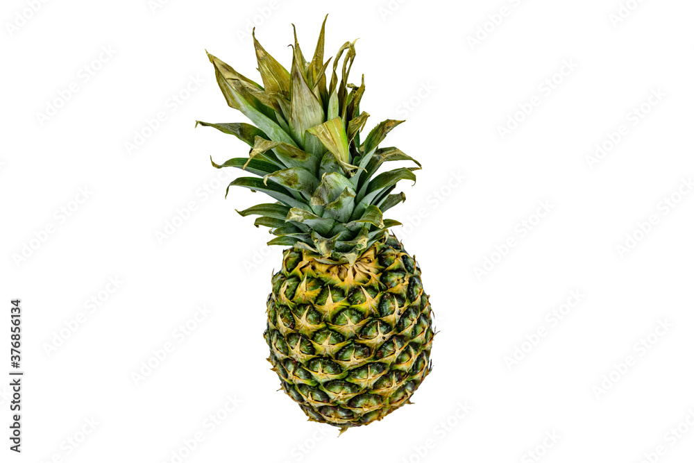 Fototapeta premium Whole ripe pineapple isolated on a white background