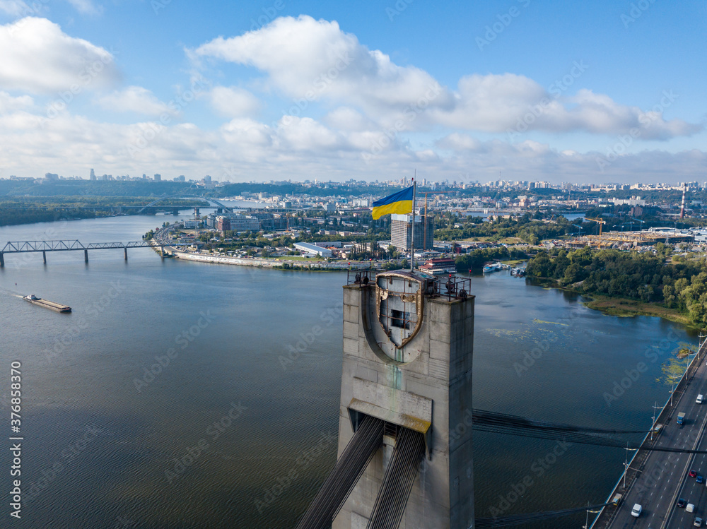 Aerial drone view. Flag of Ukraine on the North Bridge in Kiev.