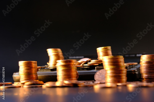 Business growth strategy of money concept, Advertising coins of finance and banking, Gold coins stacked on wood table