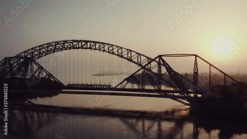 View Of Lansdowne  And Ayub Bridge Over Indus River During Evening Light. Aerial Follow Shot Left photo