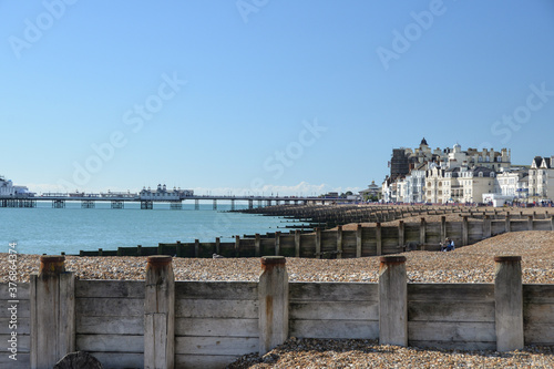View of breakwaters at the shingle beach in Eastbourne in a beautiful sunny day, England