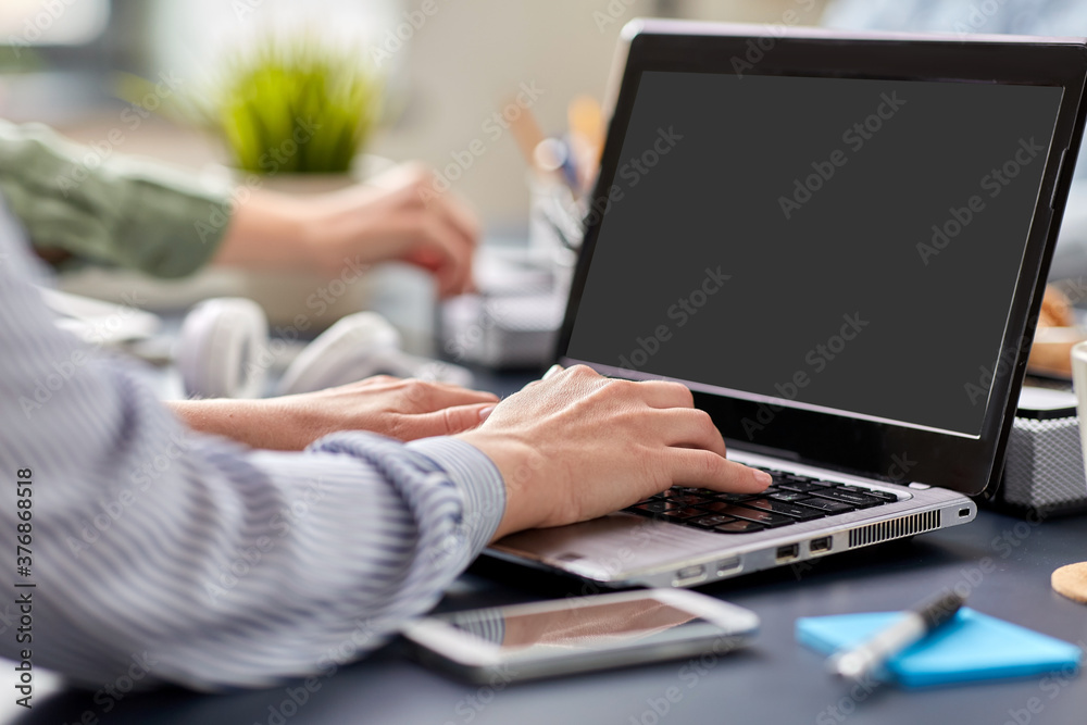 business, technology and people concept - close up of hands with laptop computer working at office business, technology and people concept - close up of hands with laptop computer working at office