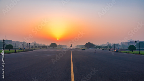 View at sunrise from rajpath 'King's Way' is a ceremonial boulevard in New Delhi, India that runs from Rashtrapati Bhavan on Raisina Hill through Vijay Chowk and India Gate photo