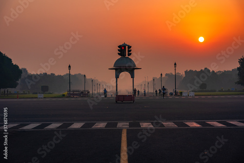 View at sunrise from rajpath 'King's Way' is a ceremonial boulevard in New Delhi, India that runs from Rashtrapati Bhavan on Raisina Hill through Vijay Chowk and India Gate