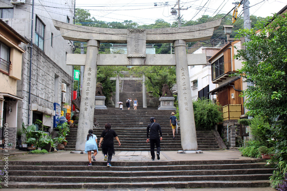 Entering the entrance gate of Suwa Shrine of Nagasaki from the main street.