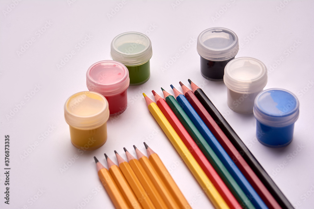 lead pencils, colored pencils, gouache paints on white background lead pencils, colored pencils, gouache paints on white background