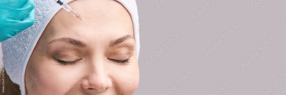 Cosmetology skin care. Face derma injection. Facial treatment. Nanotechnology. Woman dermatology doctor. Micro needle. Rejuvenation salon procedure. Eyebrow filler. Anti aging medical concept.