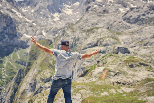 man enjoying in the mountain, adult man spending the holidays in the mountain