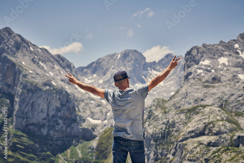 man enjoying in the mountain, adult man spending the holidays in the mountain