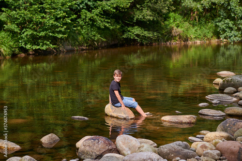 child enjoying in the mountains  child spending the holidays in the mountains