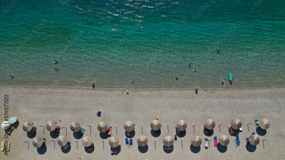 Aerial drone photo of famous crystal clear turquoise beach and bay of Panormos a popular safe sail boat anchorage in island of Skopelos, Sporades, Greece Aerial drone photo of famous crystal clear turquoise beach and bay of Panormos a popular safe sail boat anchorage in island of Skopelos, Sporades, Greece