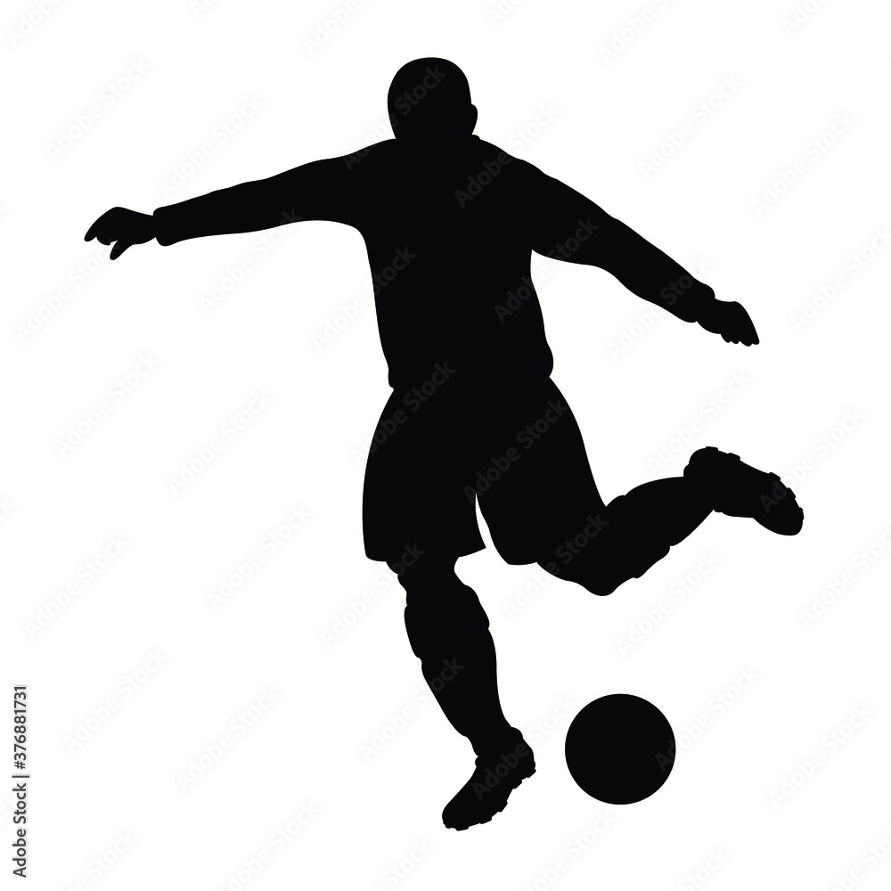 Obraz premium Silhouette of a football player who shooting a ball. 