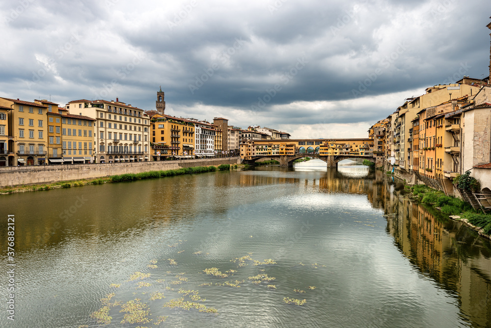Florence cityscape with the Ponte Vecchio (Old Bridge) and the River Arno, view from the bridge of Santa Trinita. Tuscany Italy, Europe
