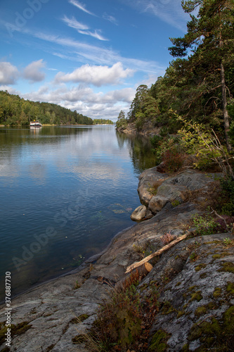 Sweden. Rocky lake shore on an autumn sunny day