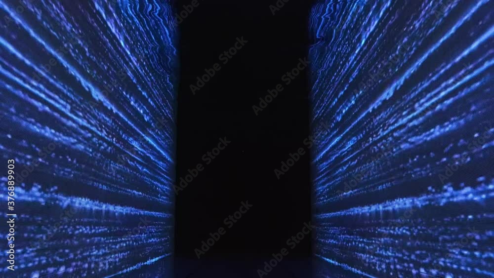 Dark room with colored LED SMD video wall. Blinking Wall Par lights