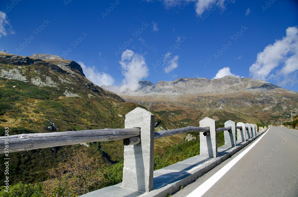 Fototapeta premium Panoramic View over Mountain Road in Switzerland.