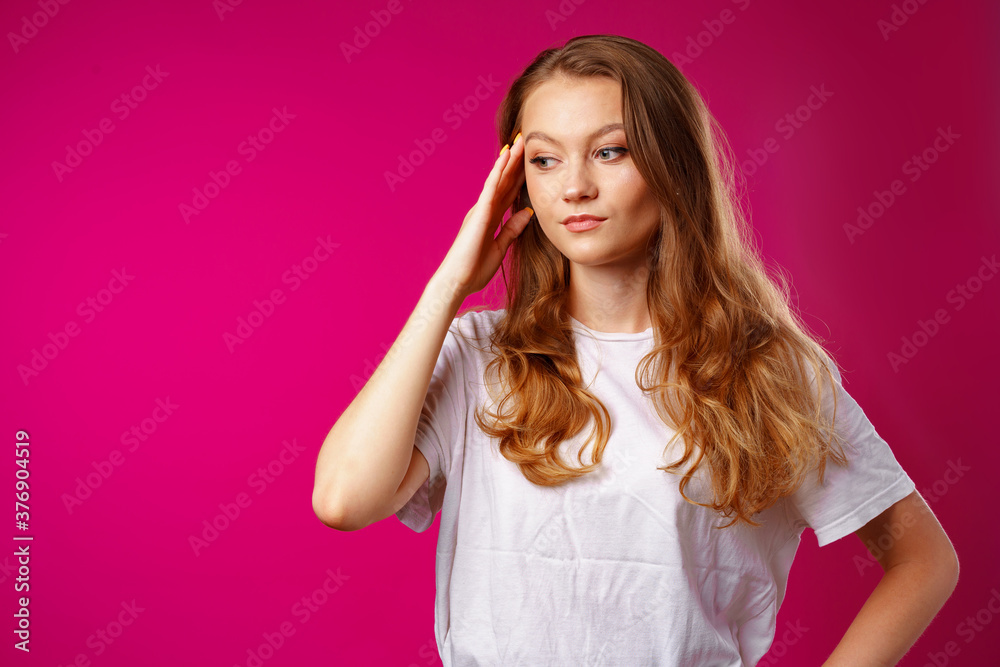 Young beautiful woman suffering from headache with hands on head Young beautiful woman suffering from headache with hands on head
