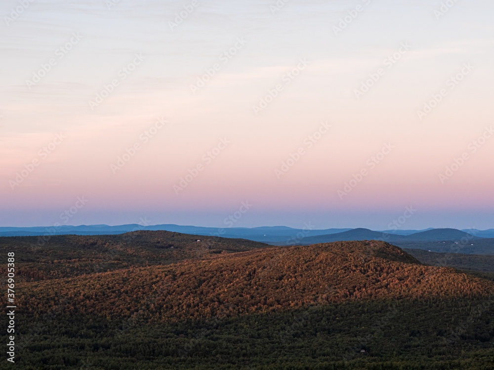 Watching the sunset on southern New Hampshire while descending North Pack Monadnock in Greenfield.