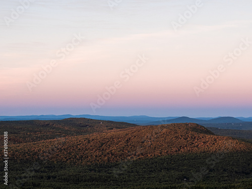 Watching the sunset on southern New Hampshire while descending North Pack Monadnock in Greenfield.