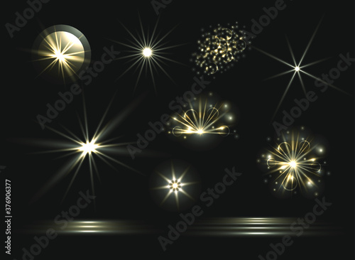 Vector glowing light effects set, explosions and stars, glittering design elements isolated on dark background, shining icons. 
