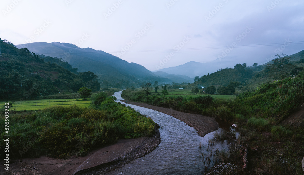 Mountains and green rice fields in the evening Nature Mountains and green rice fields in the evening Nature