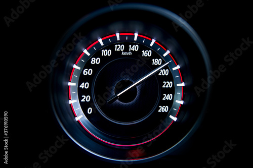 190 Kilometers per hour,light with car mileage with black background,number of speed,Odometer of car.