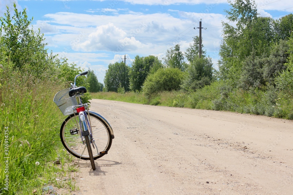Naklejka premium A road in a summer cottage village in the Moscow region, Russia.