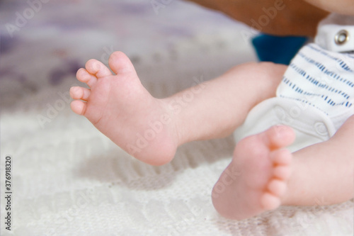 small foot of a newborn baby