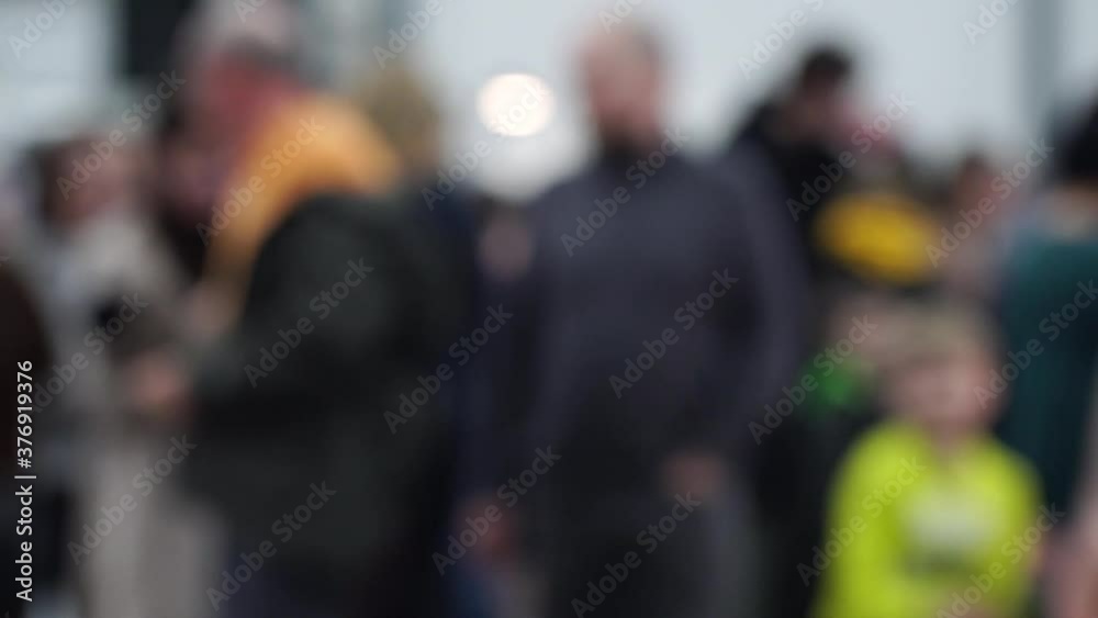 Defocused, blurred image of a crowd of people. Flea market, hangar fair, garage sale. Defocused, blurred image of a crowd of people. Flea market, hangar fair, garage sale.