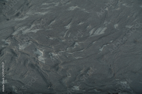 Tierra arcillosa negra en forma de dunas photo