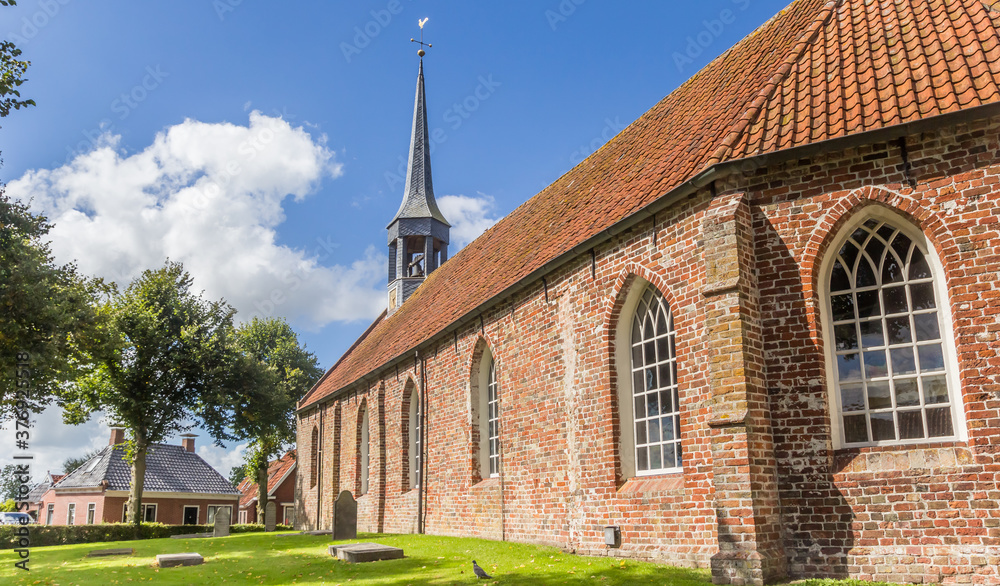 Panorama of the historic church in the center of small town Niehove, Netherlands